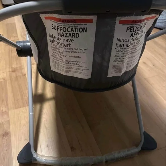 Gray and Black Baby Bassinet with Patterned Mattress